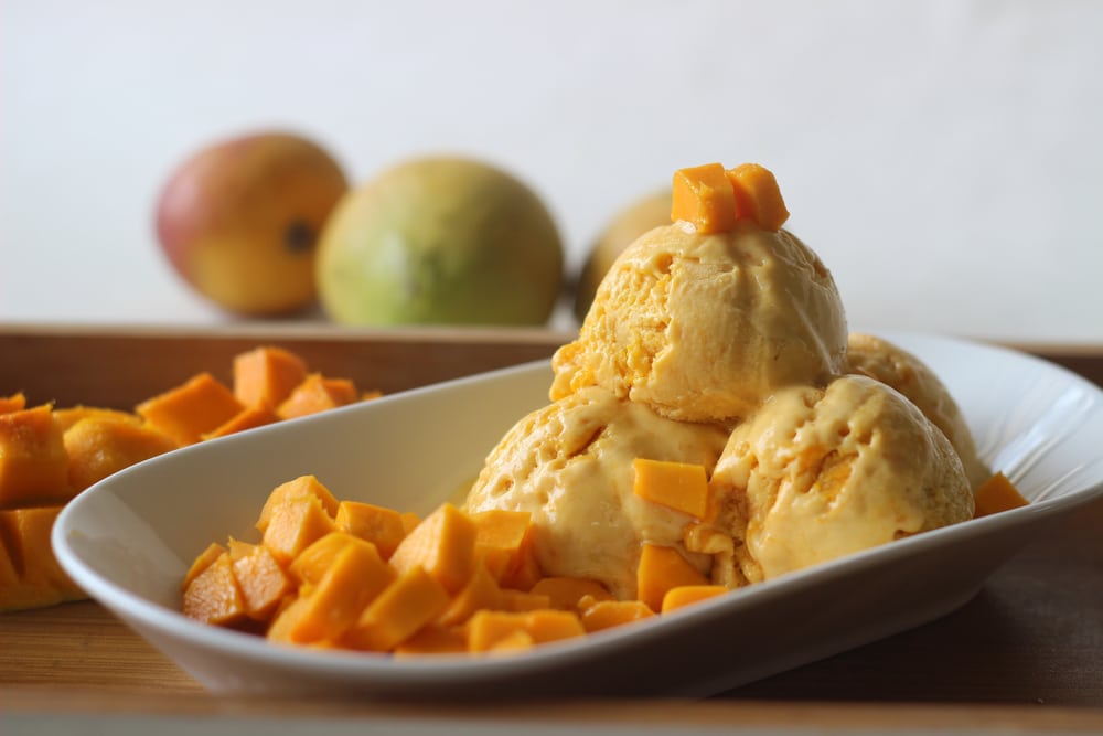 Scoops Of Home Made Mango Ice Cream Served With Fresh