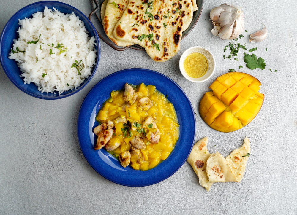 Mango Curry With Chicken And Cashew Garlic Naan Flatbread 