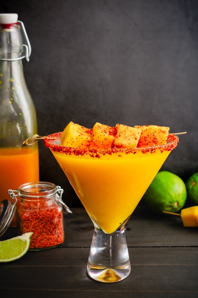 Mango Margarita With A Turmeric Chili Twist And Mango Garnish