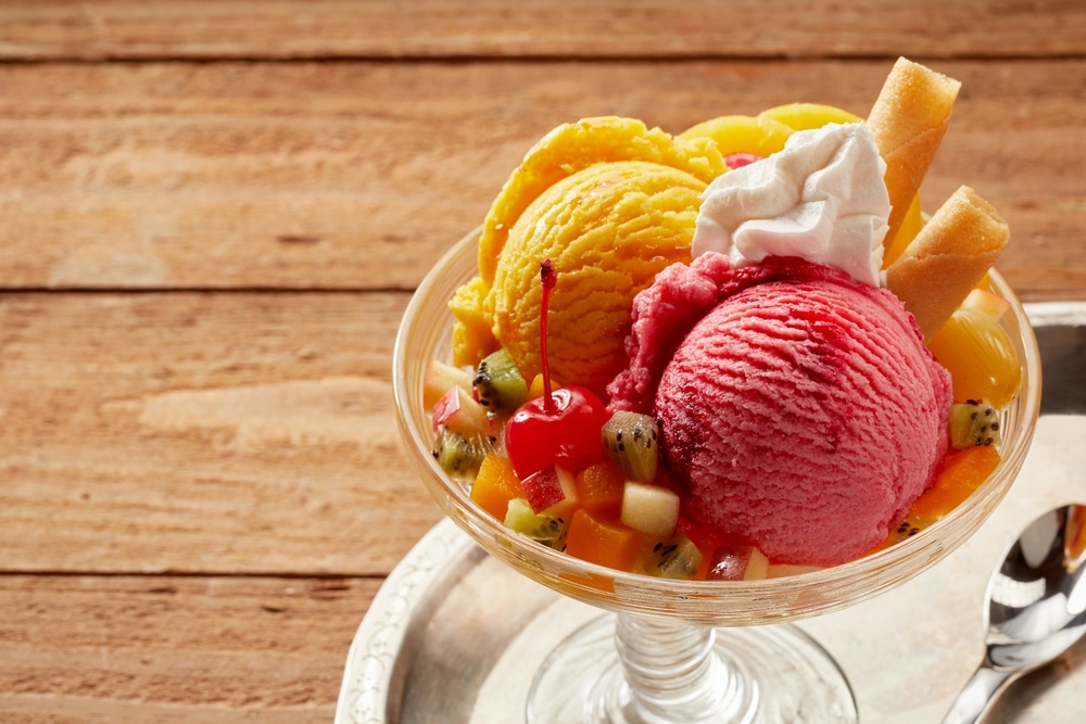 Sweet Mango And Strawberry Ice Cream Sundae With Cherry Kiwi