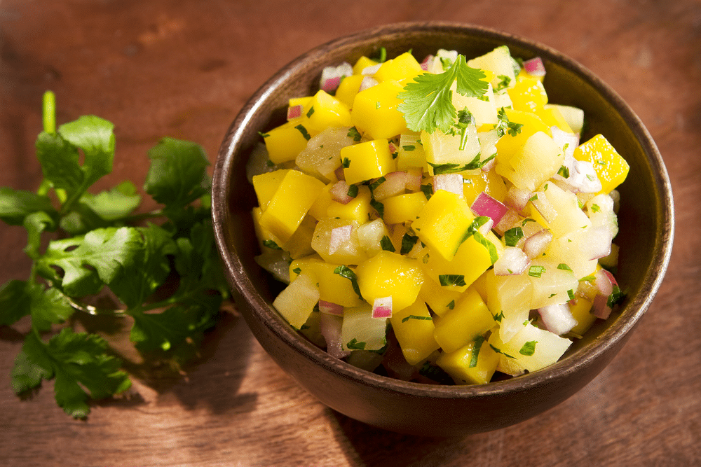 a bowl of Mango pineapple salsa