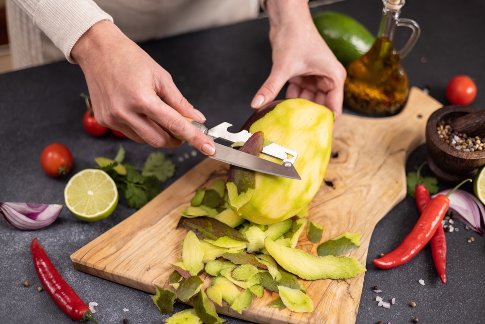  Woman Peeling Mango Fruit