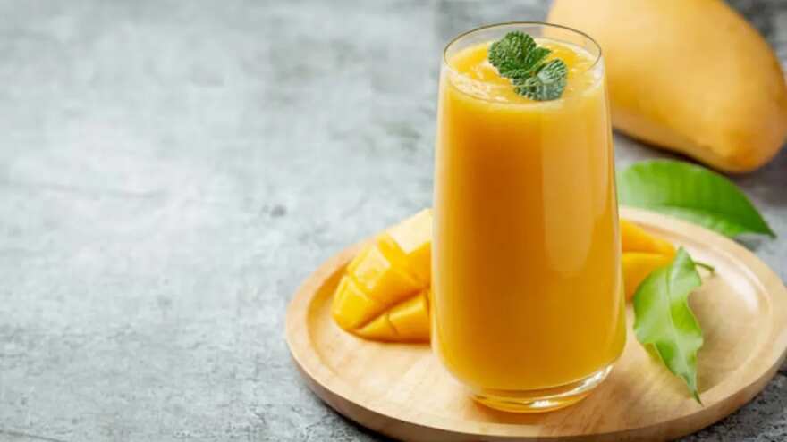 A view of mango smoothie in a glass