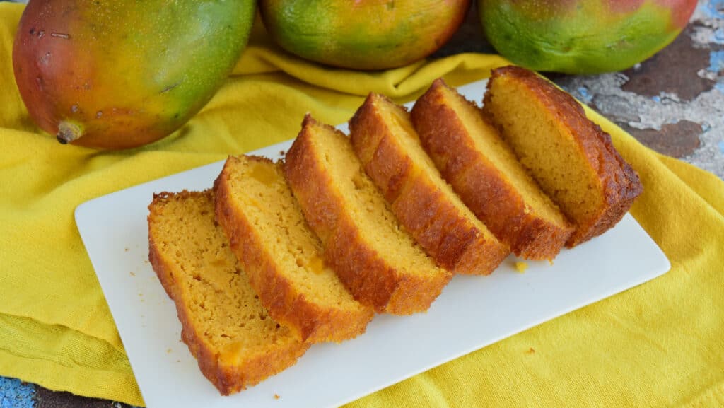 A view of a sliced mango cake A view of a sliced mango cake