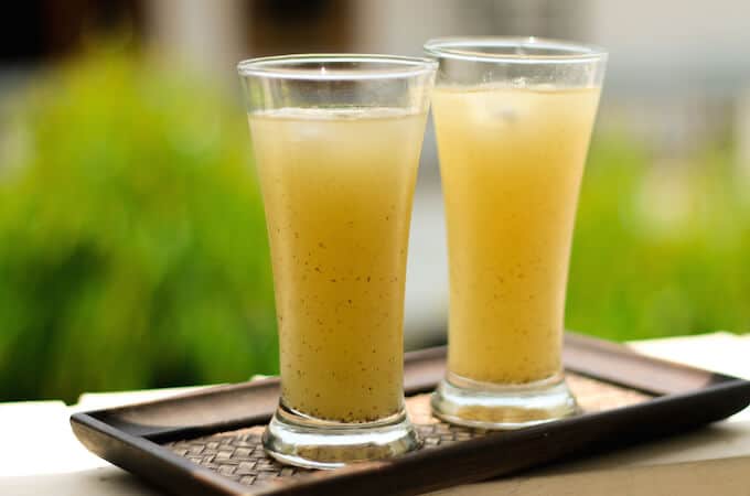 Two glasses of chilled aam panna on a tray Two glasses of chilled aam panna on a tray